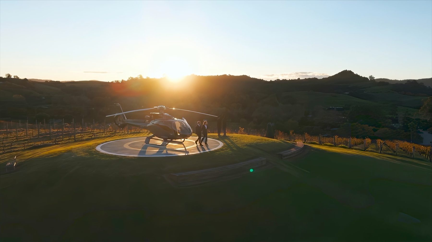Helicopter on the private helipad at Sculptureum, Matakana, at sunset