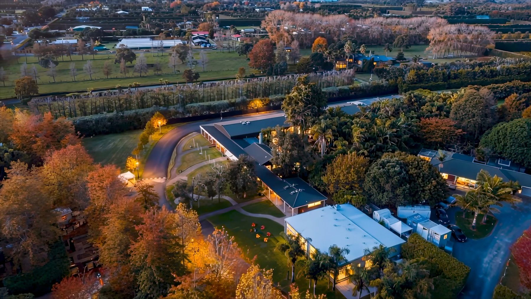 Sculptureum estate buildings and gardens at twilight, 40 Omaha Flats Road, Matakana